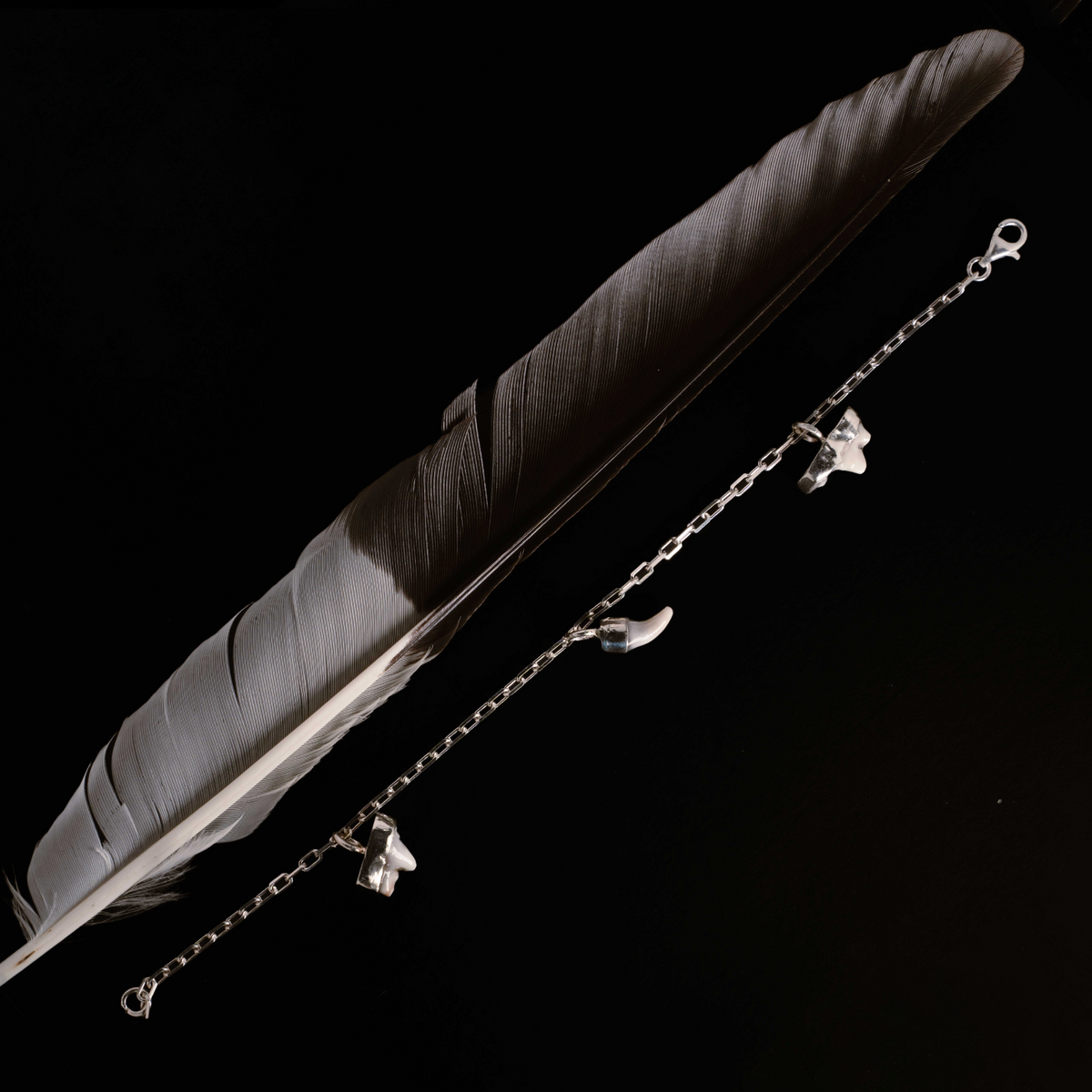 A sterling silver star pendant with ashes sealed under a clear setting